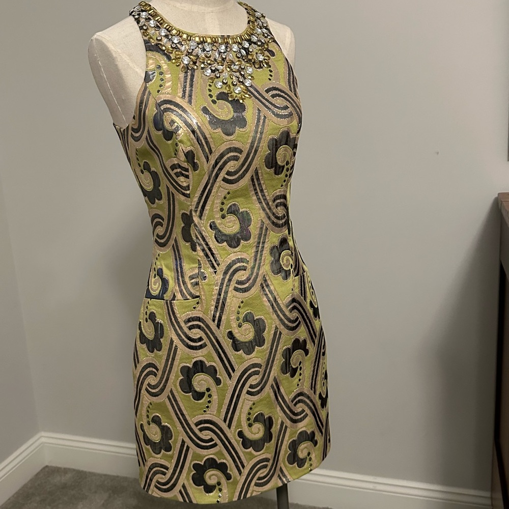 Beautiful metallic looking, beaded top, knee length dress